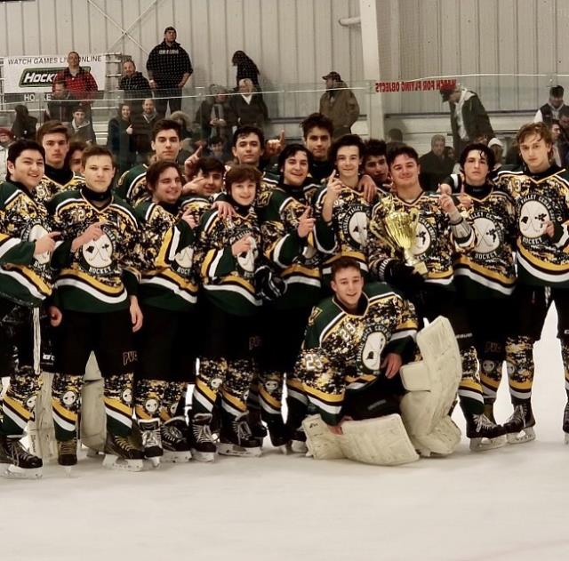 PVCG Hockey Team posing after their championship 