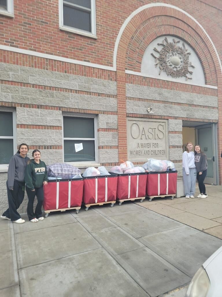 (From left to right) Sophia Bermudez, Maggie Velkoska, Jordan Newbury, and Brianna Eppler dropping off donations